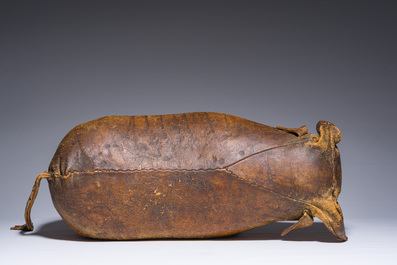 Dimitri Omersa (1927-1975): A brown leather 'bull' ottoman, third quarter 20th C.