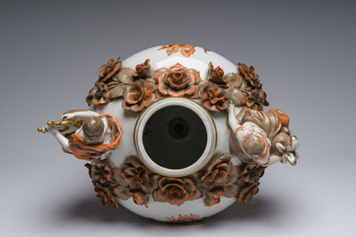 A large German polychrome and gilt decorated Saxon porcelain vase and cover on foot with relief design, Schierholz Plaue mark, 20th C.