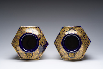 A pair of Japanese Satsuma vases with ladies and children in a garden, Meiji, 19th C.