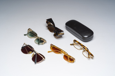 Four various sunglasses and a pair of reading glasses, Bulgari, Christian Dior, Gucci and Yves Saint Laurent, 20th C.