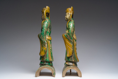 A pair of Chinese sancai roof tiles, a pair of famille rose plates and a pair of Imari style plates, Ming and later