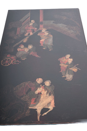 A Chinese polychrome painted lacquer panel mounted as a table, Qing and 20th C.