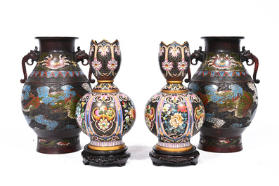 A pair of Chinese cloisonn&eacute; tulip-shaped vases and a pair of Japanese champlev&eacute; 'dragon' vases, 19th/20th C.