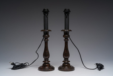 A pair of serpentine candlesticks mounted into table lamps, 19th C.