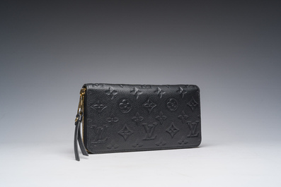 A black leather Louis Vuitton 'Cl&eacute;mence Wallet' with the original packaging, 21st C.
