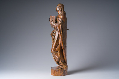 A Flemish patinated wooden 'John of Patmos' sculpture, ca. 1800