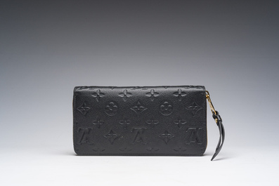 A black leather Louis Vuitton 'Cl&eacute;mence Wallet' with the original packaging, 21st C.