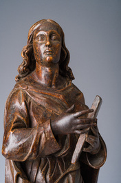 A Flemish patinated wooden 'John of Patmos' sculpture, ca. 1800