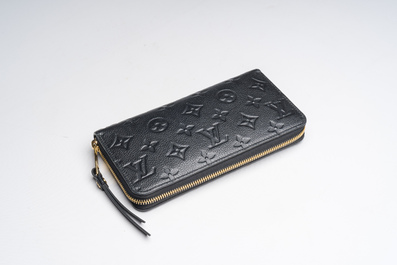 A black leather Louis Vuitton 'Cl&eacute;mence Wallet' with the original packaging, 21st C.