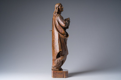 A Flemish patinated wooden 'John of Patmos' sculpture, ca. 1800