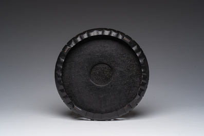 A Chinese famille rose jardini&egrave;re with floral design on a wooden base, 19th C.