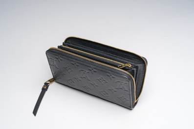 A black leather Louis Vuitton 'Cl&eacute;mence Wallet' with the original packaging, 21st C.