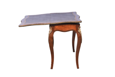 A French wooden gaming table and two side tables, 19th/20th C.