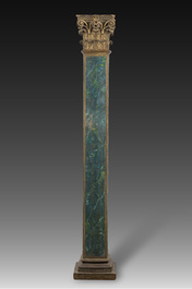 A square wooden column with green faux marble painting topped with a gilded Corinthian capital, 20th C.