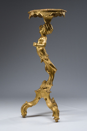 Table d'appoint en bois sculpt&eacute; et dor&eacute; &agrave; d&eacute;cor d'un homme-poisson, Italie, 19&egrave;me si&egrave;cle