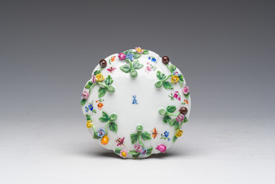 Two polychrome Saxon porcelain groups, a table piece and a cup and saucer, Germany, 19th/20th C.