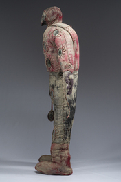 A Haitian Bizango statue of a male warrior with a sling in his hand, mixed media, 20th C.