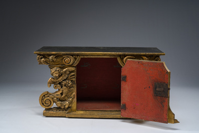 A gilt wooden tabernacle with floral design and angels, 18th C.