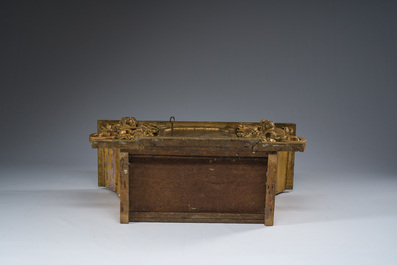 A gilt wooden tabernacle with floral design and angels, 18th C.