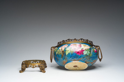 A French three-piece polychrome faience fine bronze mounted garniture with floral design, Creil Montereau Boulenger et Cie, 19th C.
