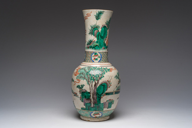 A Chinese Nanking crackle glazed famille verte vase with a visit to the court, 19th C.