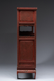 A Japanese red lacquer cabinet, Meiji/Showa, 19th/20th C.