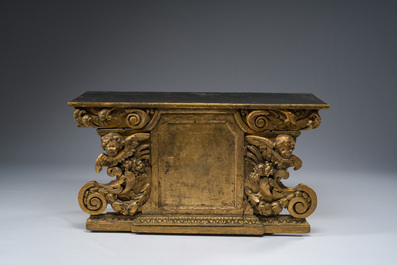 A gilt wooden tabernacle with floral design and angels, 18th C.