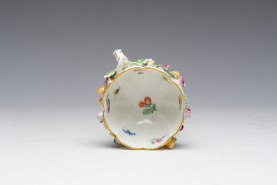 Two polychrome Saxon porcelain groups, a table piece and a cup and saucer, Germany, 19th/20th C.
