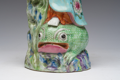 A Chinese famille rose model of Liu Hai and a famille verte of one of the Hehe brothers, 19th C.