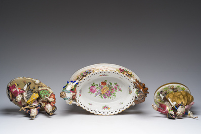 Two polychrome Saxon porcelain groups, a table piece and a cup and saucer, Germany, 19th/20th C.