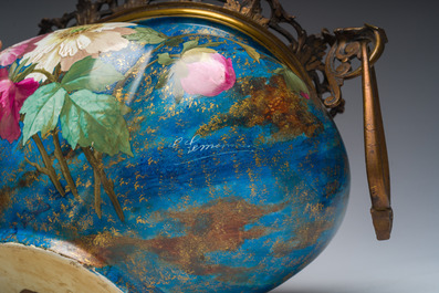 A French three-piece polychrome faience fine bronze mounted garniture with floral design, Creil Montereau Boulenger et Cie, 19th C.