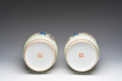 A pair of Chinese famille rose vases with court ladies relaxing in a palace garden, Qianlong mark, Republic, 20th C.