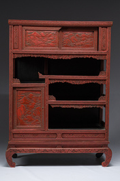 A Japanese red lacquer cabinet, Meiji/Showa, 19th/20th C.