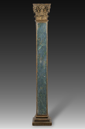 A square wooden column with green faux marble painting topped with a gilded Corinthian capital, 20th C.