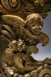 A gilt wooden tabernacle with floral design and angels, 18th C.