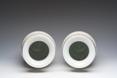 A pair of Chinese famille rose vases with court ladies relaxing in a palace garden, Qianlong mark, Republic, 20th C.