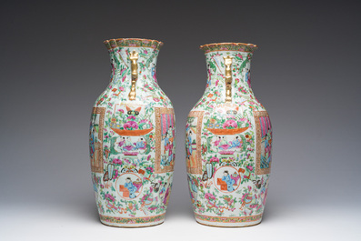 A pair of Chinese Canton famille rose vases with palace scenes and floral design, 19th C.