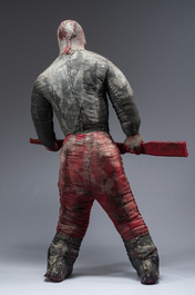 A Haitian Bizango statue of a male warrior with a firearm in his hand, mixed media, 20th century