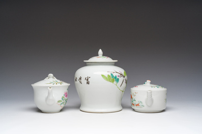 Two Chinese famille rose teapots and covers and a qianjiang cai jar and cover with floral design, 19th/20th C.