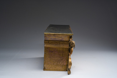 A gilt wooden tabernacle with floral design and angels, 18th C.