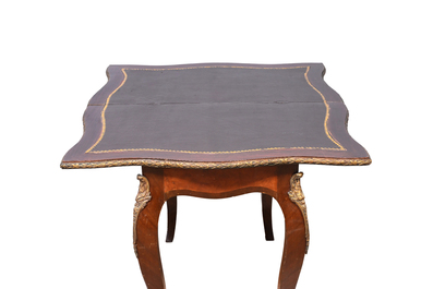 A French wooden gaming table and two side tables, 19th/20th C.