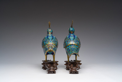 A pair of Chinese cloisonn&eacute; peacock-shaped censers and covers, 19th C.