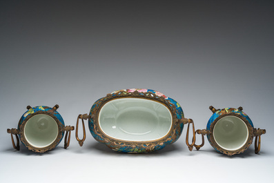 A French three-piece polychrome faience fine bronze mounted garniture with floral design, Creil Montereau Boulenger et Cie, 19th C.