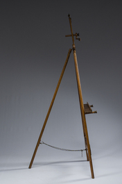 A carved walnut painter's easel with brass mounts, early 20th C.