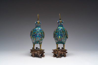 A pair of Chinese cloisonn&eacute; peacock-shaped censers and covers, 19th C.