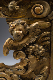 A gilt wooden tabernacle with floral design and angels, 18th C.