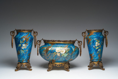 A French three-piece polychrome faience fine bronze mounted garniture with floral design, Creil Montereau Boulenger et Cie, 19th C.