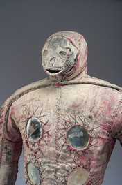 A Haitian Bizango statue of a male warrior with a sling in his hand, mixed media, 20th C.