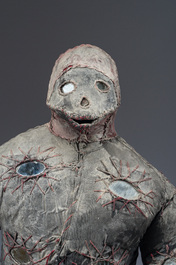 A Haitian Bizango statue of a male warrior with a firearm in his hand, mixed media, 20th century