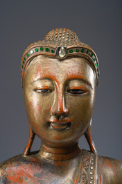 A tall Thai inlaid gilt lacquered wooden figure of a standing Buddha, 20th C.